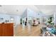 Spacious living area featuring a sectional sofa and fireplace at 10101 Eagle Preserve Dr, Englewood, FL 34224