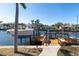 Spacious dock with seating area and lift for easy boat access at 901 31St Ne Ter, St Petersburg, FL 33704