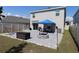Spacious backyard with patio, fire pit, and hammock at 12113 Water Ash Pl, Riverview, FL 33569