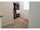 Large bedroom closet with ample shelving and hanging space at 12113 Water Ash Pl, Riverview, FL 33569