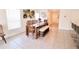 Dining room with a wooden table and bench seating at 12113 Water Ash Pl, Riverview, FL 33569