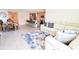 Open living room and kitchen with hardwood floors at 12113 Water Ash Pl, Riverview, FL 33569