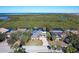 Waterfront property showcasing a house and lush surroundings at 4147 Marine Pkwy, New Port Richey, FL 34652