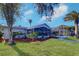 Spacious backyard with pool, patio, and lush landscaping at 4147 Marine Pkwy, New Port Richey, FL 34652