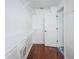 Spacious walk-in closet with wire shelving and wood-look flooring at 5627 War Admiral Dr, Wesley Chapel, FL 33544