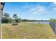Spacious backyard with lake view and fire pit at 708 Fern Leaf Dr, Ruskin, FL 33570