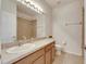 Bathroom with a vanity, toilet, and shower/tub combo at 708 Fern Leaf Dr, Ruskin, FL 33570