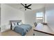 Bright bedroom with a lake view and built-in workspace at 708 Fern Leaf Dr, Ruskin, FL 33570