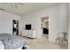 Main bedroom with dresser and access to the bathroom at 708 Fern Leaf Dr, Ruskin, FL 33570