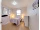 Cozy bedroom with light walls and a comfortable bed at 708 Fern Leaf Dr, Ruskin, FL 33570