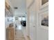Bright entryway with a wooden console table and framed artwork at 708 Fern Leaf Dr, Ruskin, FL 33570
