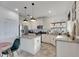 Modern kitchen with granite countertops, stainless steel appliances, and island at 708 Fern Leaf Dr, Ruskin, FL 33570