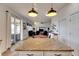 Kitchen with granite countertop island and view of Gathering room at 708 Fern Leaf Dr, Ruskin, FL 33570
