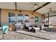 Relaxing screened porch with outdoor furniture and grill at 708 Fern Leaf Dr, Ruskin, FL 33570