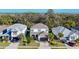 Aerial view of three houses in a community at 5935 Maidenstone Way, Palmetto, FL 34221