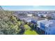 Aerial view showcasing home's backyard and neighborhood at 5935 Maidenstone Way, Palmetto, FL 34221