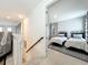 Two twin beds in a well-lit and nicely decorated bedroom at 5935 Maidenstone Way, Palmetto, FL 34221
