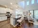 Modern kitchen with white cabinets, granite countertops, and island at 5935 Maidenstone Way, Palmetto, FL 34221
