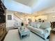 Spacious living room with high ceilings and neutral color palette at 5935 Maidenstone Way, Palmetto, FL 34221