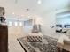 Open loft overlooking the lower level with a seating area at 5935 Maidenstone Way, Palmetto, FL 34221