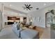 Spacious living room with open floor plan, comfortable seating, and large windows at 7506 Parkshore Dr, Apollo Beach, FL 33572
