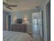Bright bedroom with a view of another room and lots of natural light at 9107 Brunswick Ln, Tampa, FL 33615