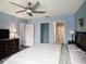 Spacious bedroom with a king-size bed and ensuite bathroom at 9107 Brunswick Ln, Tampa, FL 33615