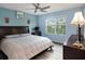 Spacious bedroom with king-size bed, large window, and ample natural light at 9107 Brunswick Ln, Tampa, FL 33615