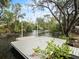 Private backyard dock offering waterfront access and relaxation at 9107 Brunswick Ln, Tampa, FL 33615