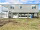 Two-story home, elevated, with fenced backyard at 9107 Brunswick Ln, Tampa, FL 33615