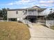Two-story home with front porch and driveway at 9107 Brunswick Ln, Tampa, FL 33615
