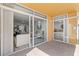 View from Balcony into Living Room and Bedroom at 16308 Gulf Blvd # 303, Redington Beach, FL 33708