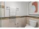 Updated bathroom with tile backsplash and modern toilet at 16308 Gulf Blvd # 303, Redington Beach, FL 33708