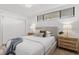Bedroom with an upholstered bed frame, modern decor, and ample light at 16308 Gulf Blvd # 303, Redington Beach, FL 33708