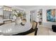 Dining area view of the kitchen and built in shelves at 16308 Gulf Blvd # 303, Redington Beach, FL 33708