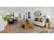 Inviting living room showcases a comfortable sofa, round coffee tables, and neutral color palette at 16308 Gulf Blvd # 303, Redington Beach, FL 33708