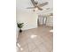 Spacious living room featuring tile floors and ceiling fan at 813 89Th N Ave, St Petersburg, FL 33702