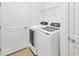 Laundry room with side-by-side washer and dryer at 11926 Cinnamon Fern Dr, Riverview, FL 33579
