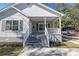 Close-up showcasing the home's front porch and the address number above the door at 1521 Preston S St, St Petersburg, FL 33712