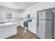 Modern kitchen featuring stainless steel appliances and ample counter space at 1521 Preston S St, St Petersburg, FL 33712