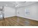 Spacious living room featuring hardwood floors, recessed lighting, ceiling fan and bright windows at 1521 Preston S St, St Petersburg, FL 33712