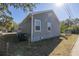 Rear view showing siding, windows, and foundation at 1521 Preston S St, St Petersburg, FL 33712