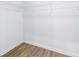 Walk-in closet with wire shelving and wood look floors at 1521 Preston S St, St Petersburg, FL 33712
