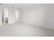 Spacious bedroom with neutral carpeting, leading to en-suite bathroom at 17203 Luminous Ave, Venice, FL 34293