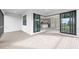 Covered patio with brick flooring and sliding glass doors to the home's interior at 17203 Luminous Ave, Venice, FL 34293