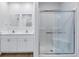 This spacious bathroom offers a double vanity and walk-in shower at 719 19Th S St, St Petersburg, FL 33712