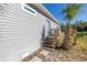 Exterior of home with siding, steps, and palm tree at 719 19Th S St, St Petersburg, FL 33712