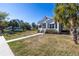 Home with a quaint porch, neat landscaping, and a concrete walkway at 719 19Th S St, St Petersburg, FL 33712
