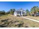 Charming home with front porch, white trim, and manicured landscaping at 719 19Th S St, St Petersburg, FL 33712