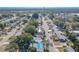 Aerial view of a house on a street in a residential neighborhood at 4202 Las Vegas Dr, New Port Richey, FL 34653